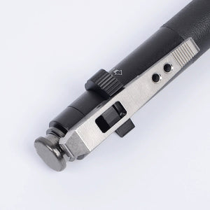 Close-up of the metal release mechanism and textured grip