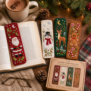 Classic Christmas felt bookmarks beside an open book and cocoa
